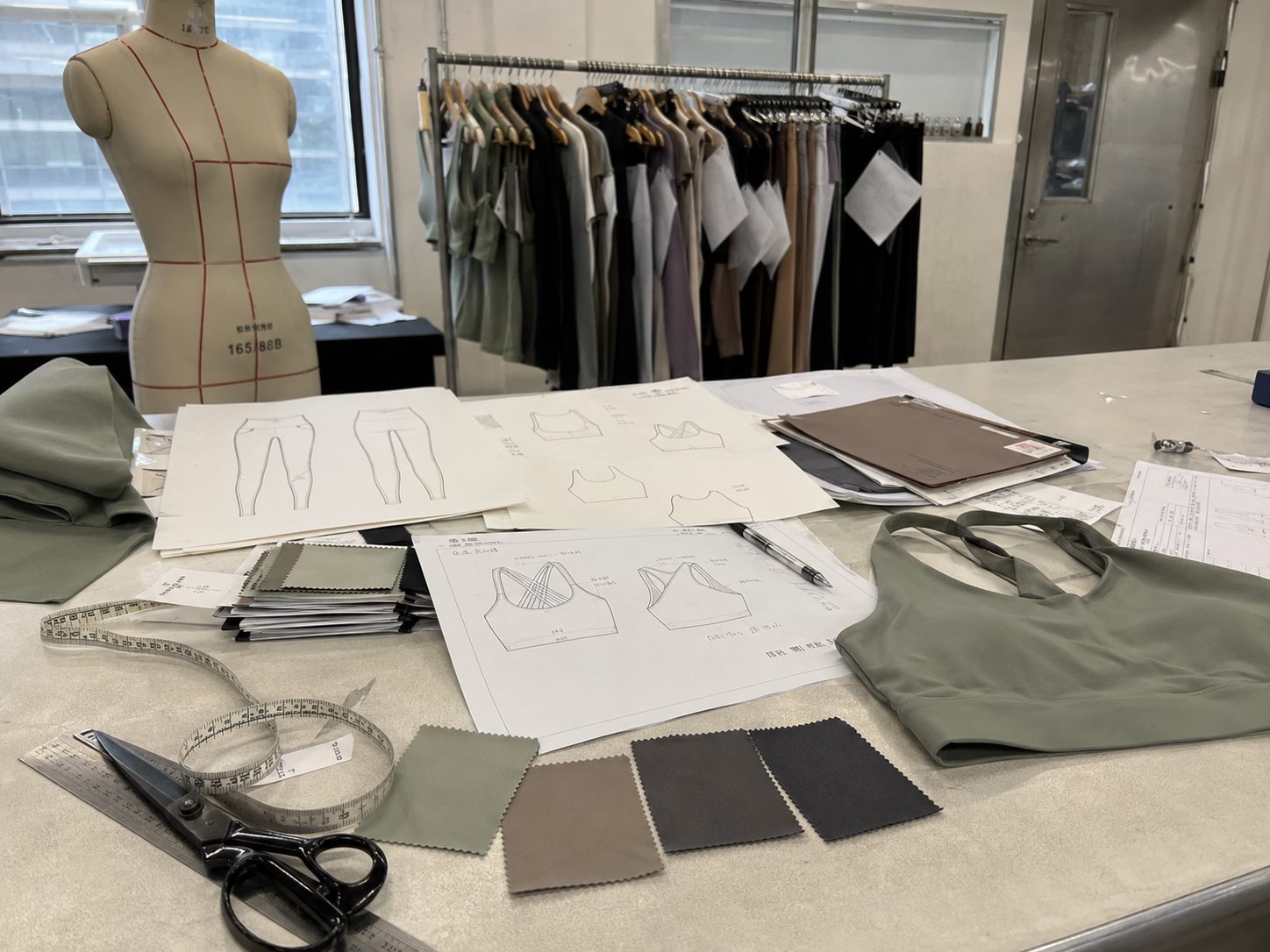 Activewear sample development studio review with patterns fabric and notes